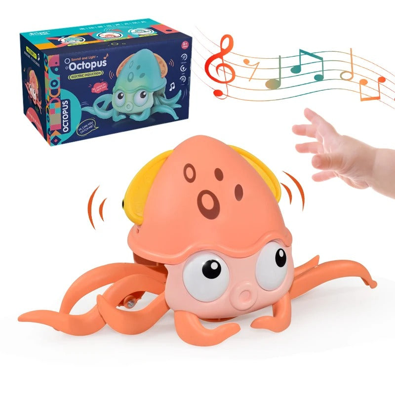 Jouet-musical-bebe-craby-squidly-rose